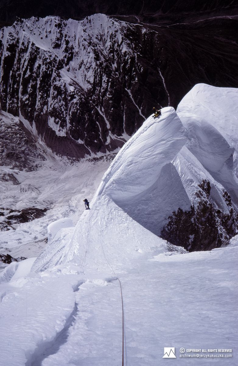 Participants of the expedition while climbing the great serac. At the top of the serac are: Jerzy Kukuczka and Sławomir Łobodziński. Carlos Carsolio climbs below.