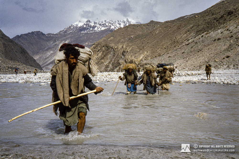 Porters in the Brald River Valley on their way to base camp.