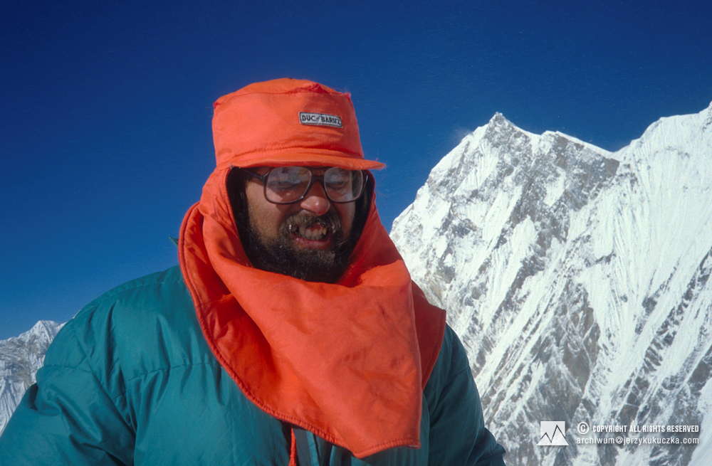 Ryszard Warecki on the slope of Annapurna. Behind him Annapurna I East peak (8010 m above sea level) is visible.