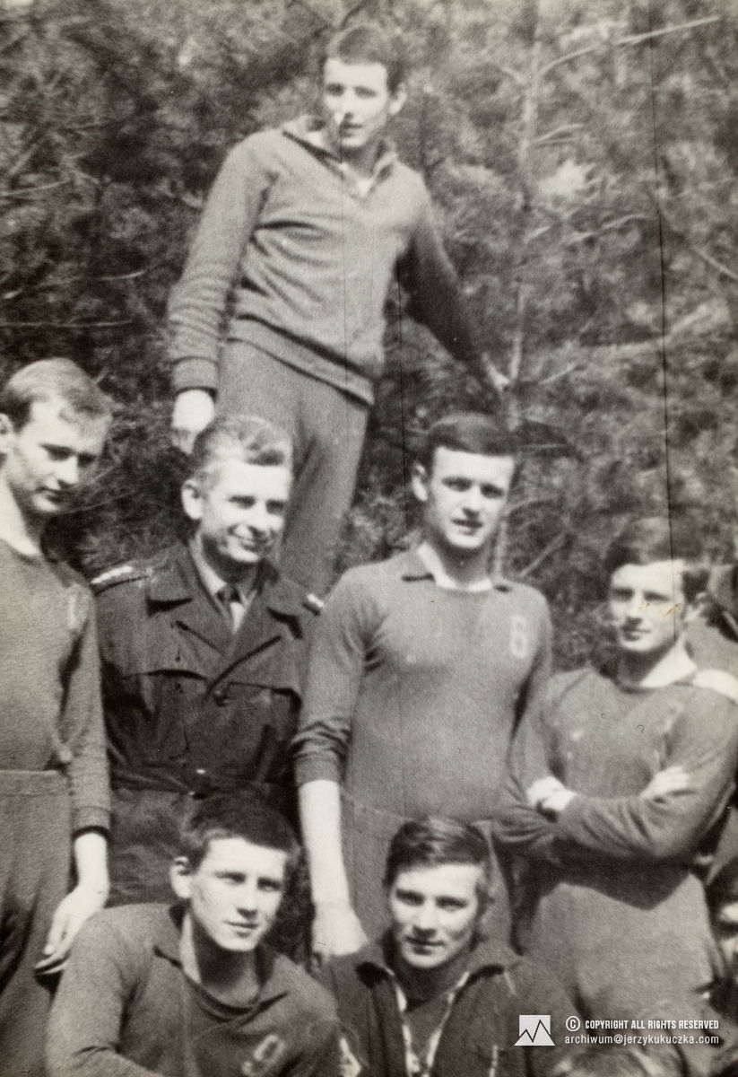 A group photo taken during Jerzy Kukuczka's military service. Jerzy Kukuczka crouches second from the left.