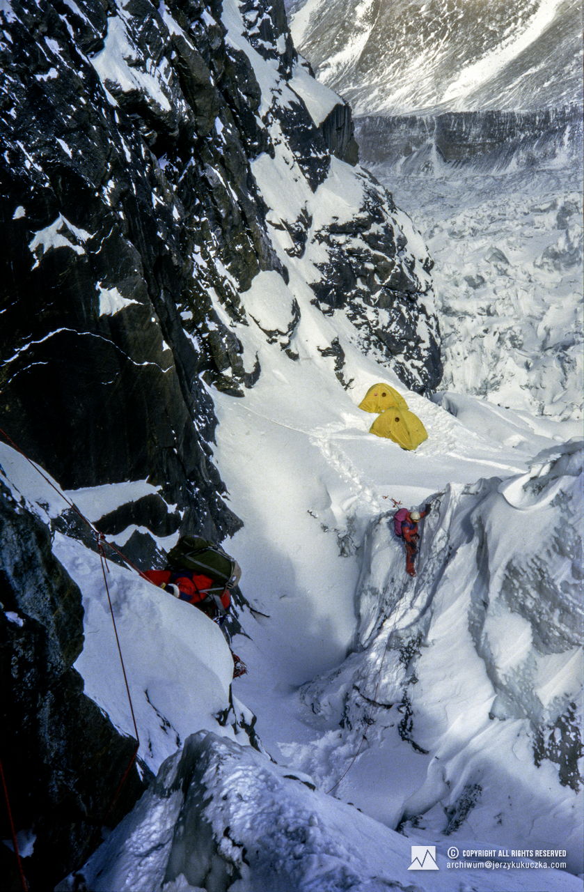 Participants of the expedition while climbing. From the left: Janusz Skorek and Andrzej Czok. In the background camp I (5200 m above sea level) is visible.