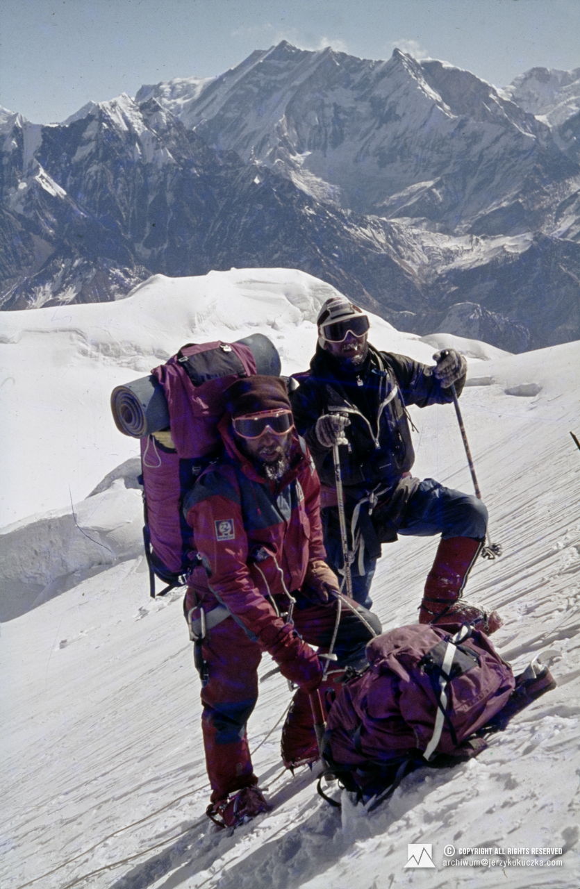Climbers on the slope of Dhaulagiri. From the left: Andrzej Czok and Jerzy Kukuczka. In the background the north face of Annapurna. is visible