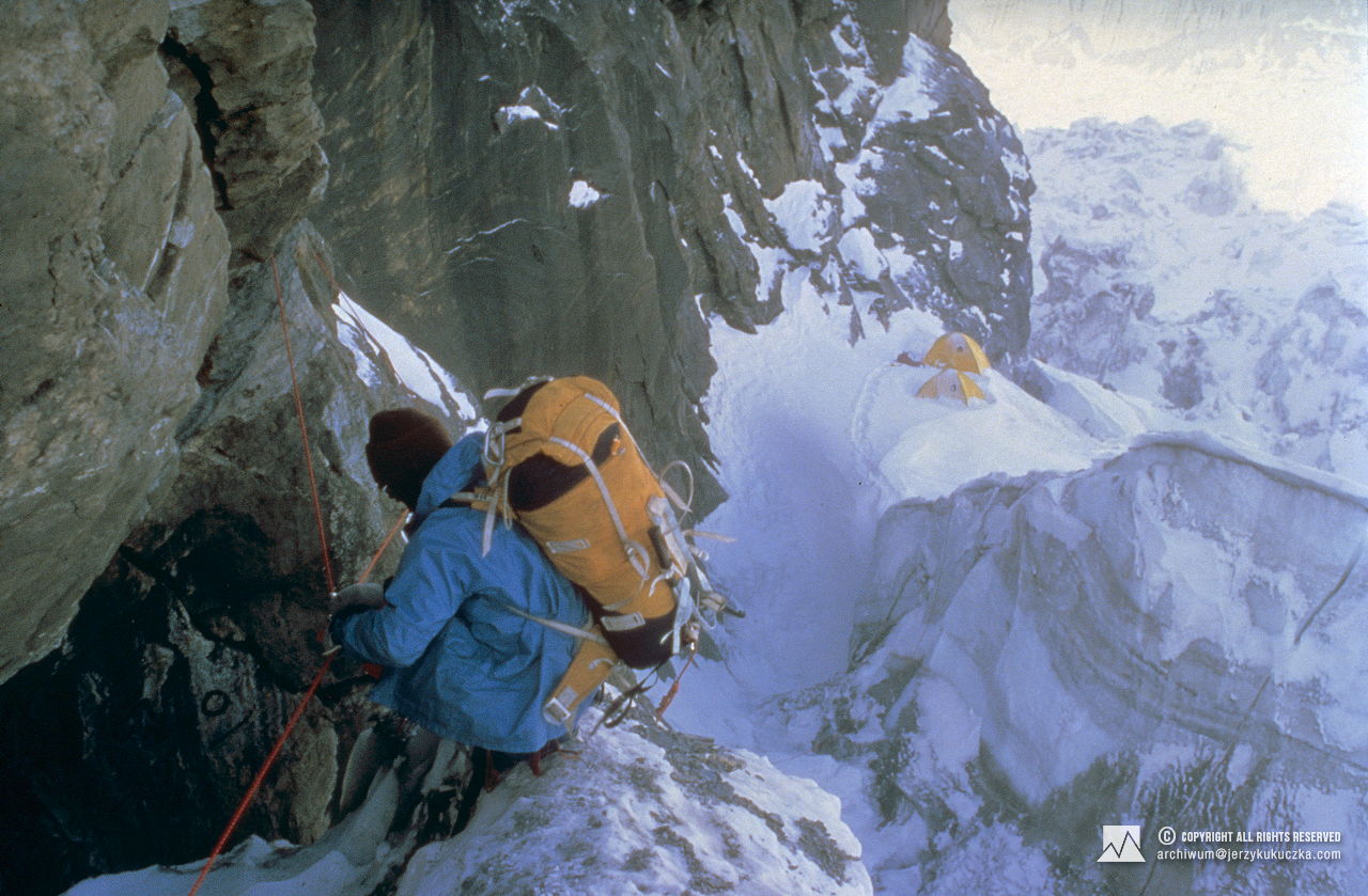 Andrzej Machnik while climbing. In the background camp I (5200 m above sea level) is visible.