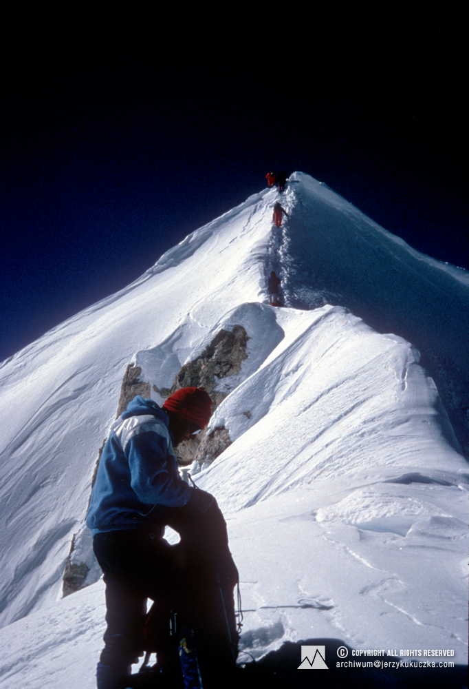 Participants of the expedition on the slope of Shisha Pangma. Artur Hajzer stands in the foreground.