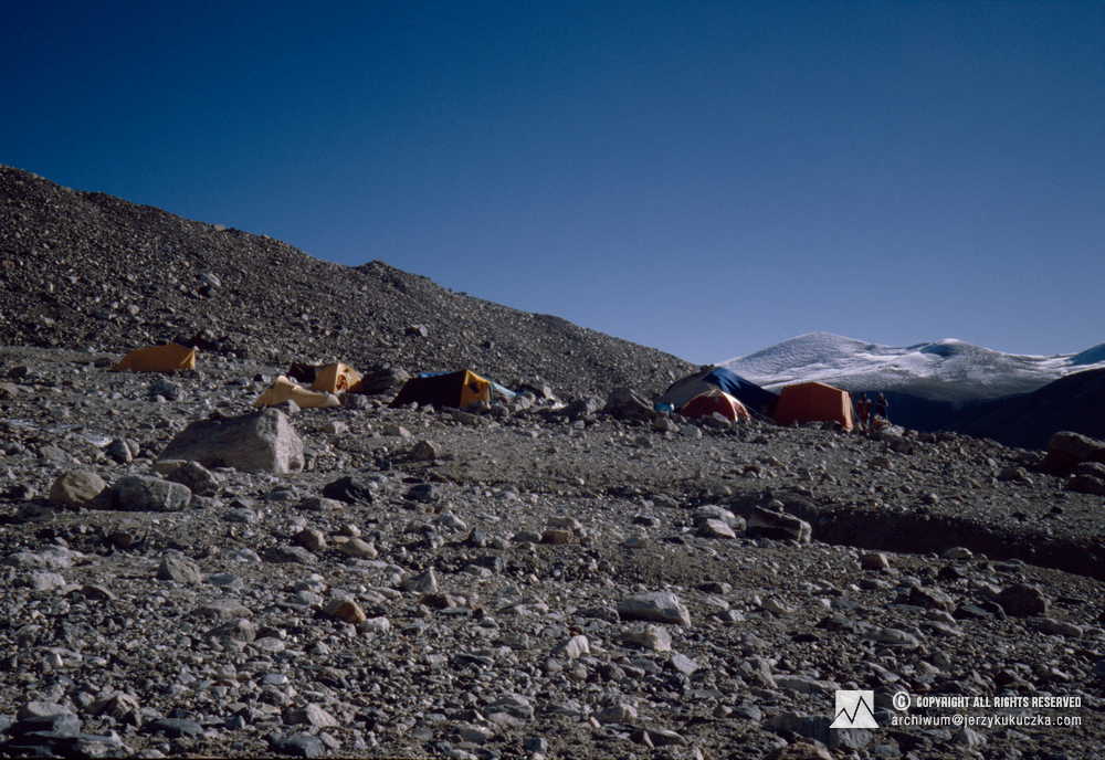 Climbers in the base camp. Janusz Majer and Lech Korniszewski are standing by the tent from the left.