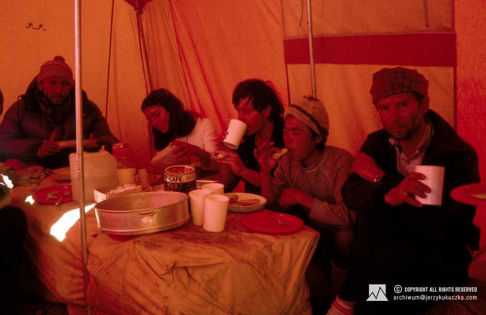 Participants of the expedition in the mess tent. From the right Wojtek Kurtyka, NN, Carlos Carsolio, Elsa Avila and sirdar.