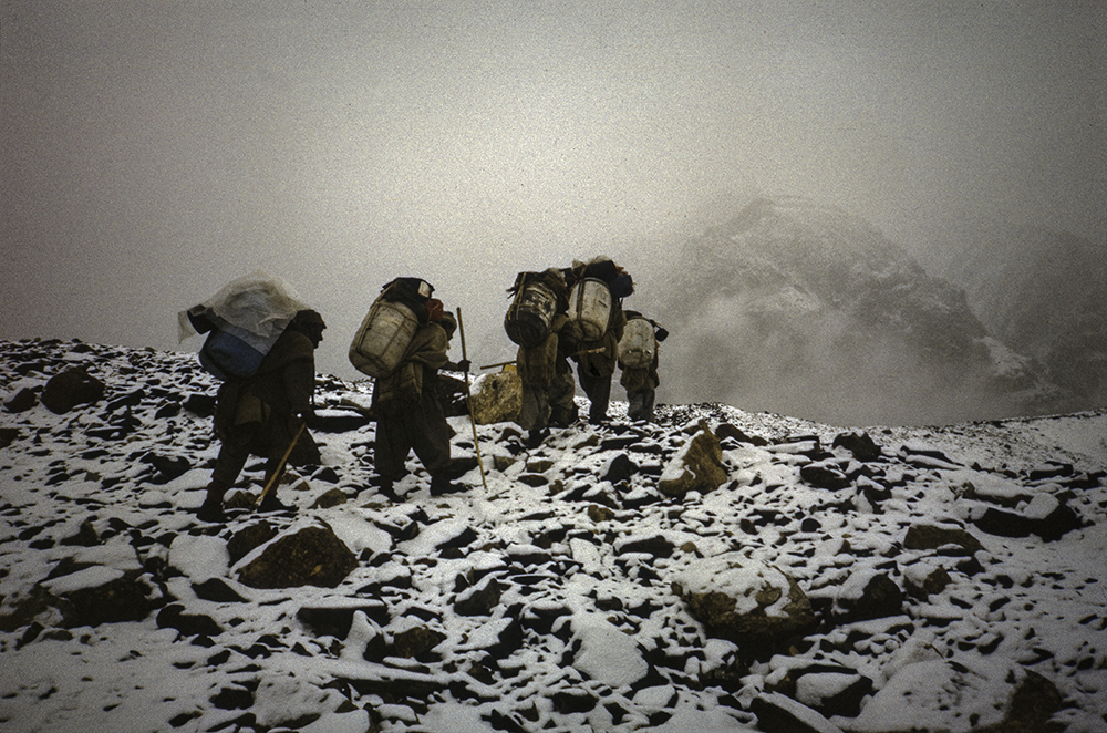 Porters on their way to the basecamp.